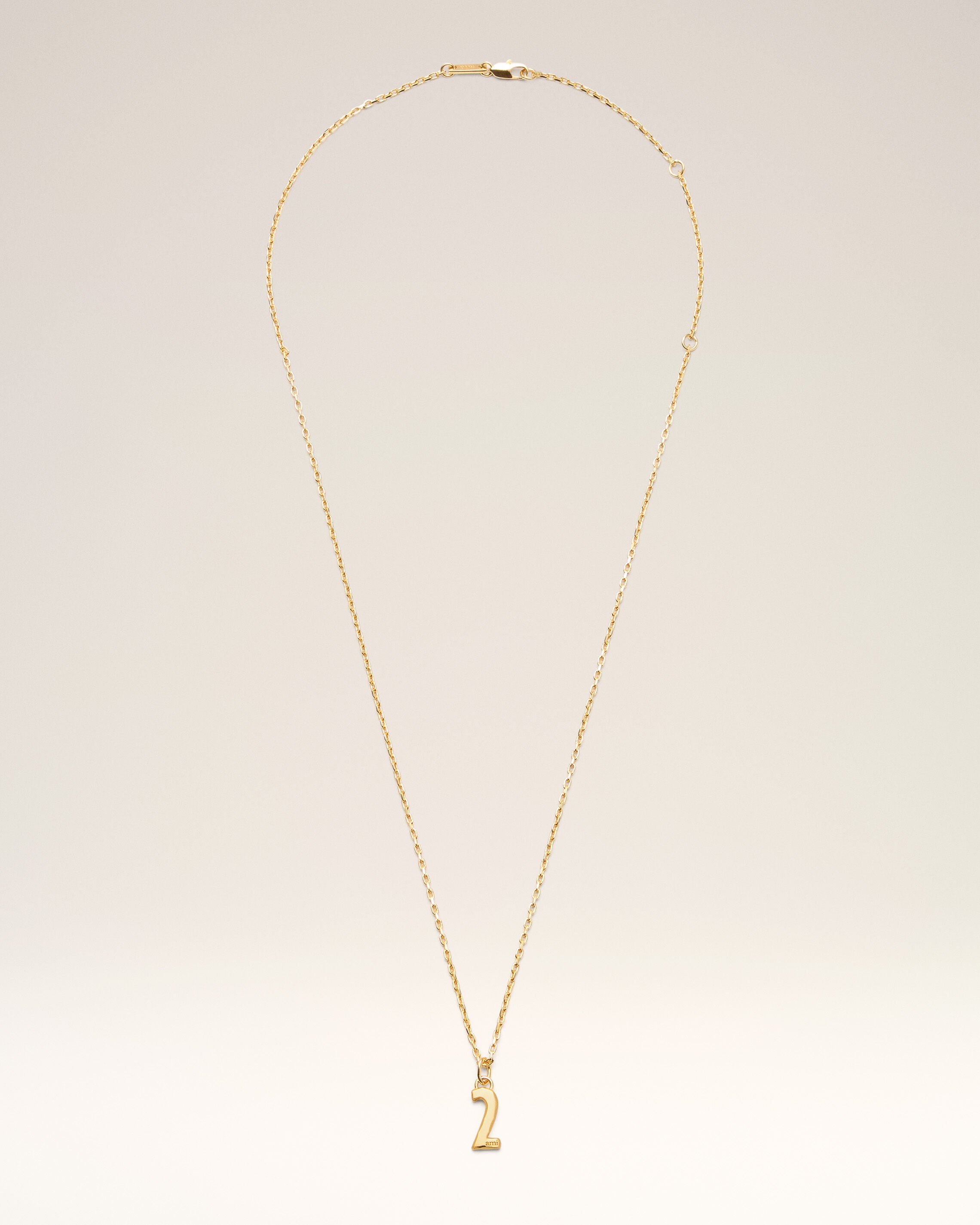GULD Guldbrons slaget "2" halsband | Ami Paris